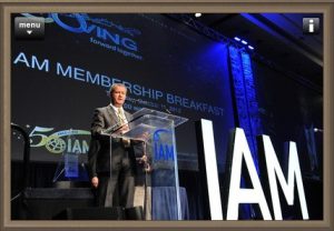 Alain Taïeb giving a speech at the 50th IAM annual meeting.